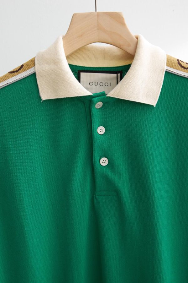 Green, Black and light-pink polo shirts